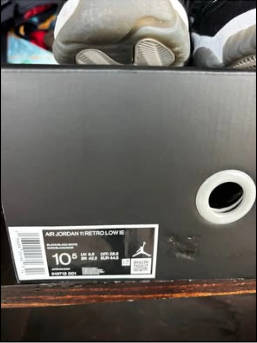 Jordan Retro Low IE Sneakers in Black and White